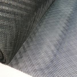 Plastic insect netting, a fine mesh for use as insect screening - close-up of black insect mesh
