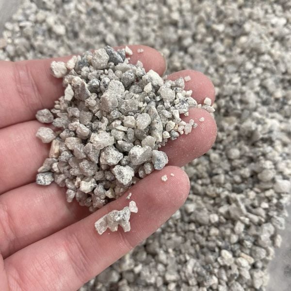 Close up of gravel on top of a houseplant